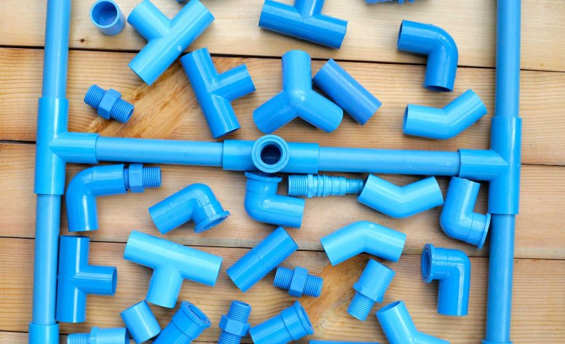 plumber equipment with blue pvc pipe connections